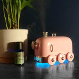This fun new Pink Ultrasonic Diffuser features colour changing lights and gentle train sound effects